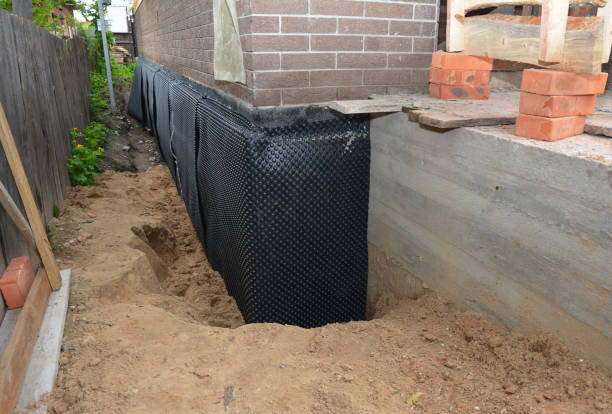 Happy homeowners after waterproofing job in South Vienna